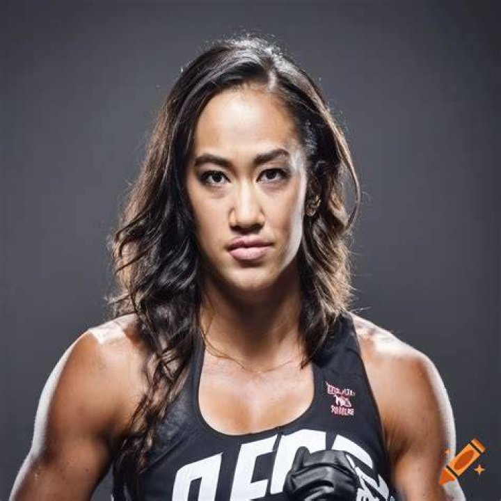 AJ Lee posing