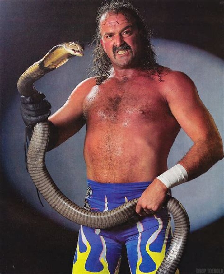 Jake Roberts with his snake