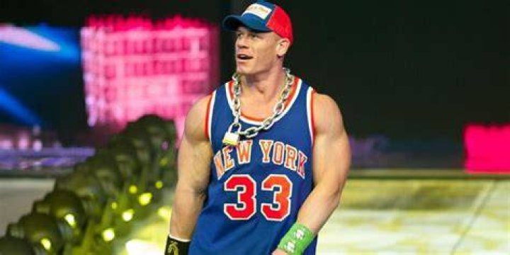 John Cena wearing a Knicks jersey.
