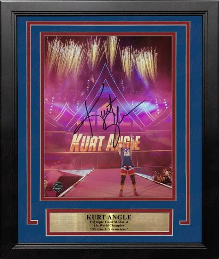 Kurt Angle making his entrance alongside Team Angle.