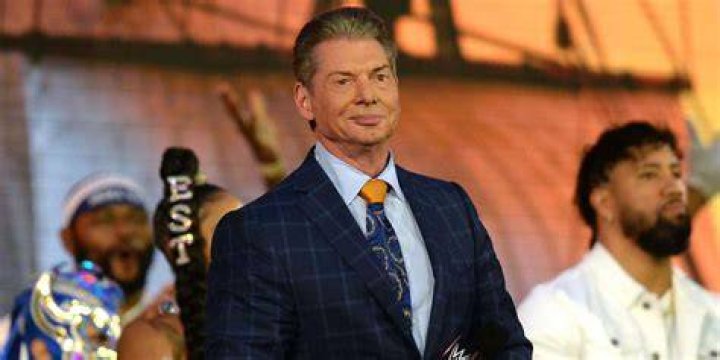 Legacy Standing Over Shane McMahon