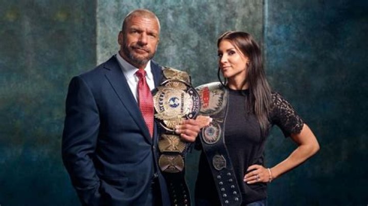 Picture of Triple H standing with Evolution.
