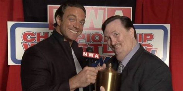 Shaun Ricker smiling next to Percy Pringle