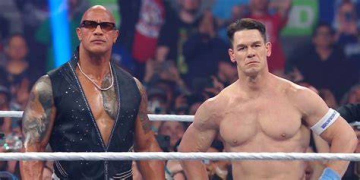 The Rock stalking John Cena.